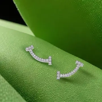 Replica T smile earrings with diamonds white gold plated main1