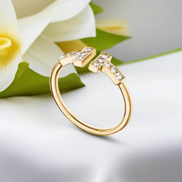 Replica T wire ring with round brilliant diamonds yellow gold plated main